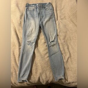 Good American light denim distressed jeans